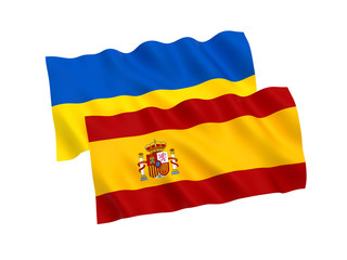 National fabric flags of Ukraine and Spain isolated on white background. 3d rendering illustration. 1 to 2 proportion.