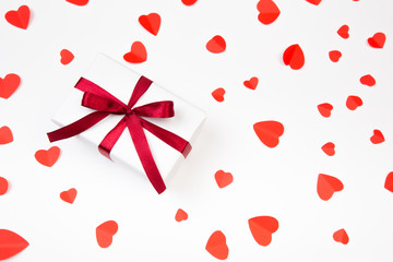Valentine day composition: .gift boxe with bow and red  hearts, photo template, background. Top View.