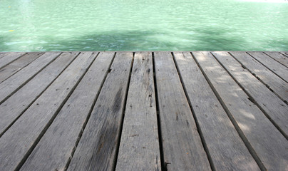 Wood plank floor on water surface background