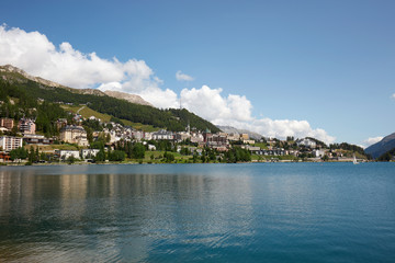 Sankt Moritz town and lake in a sunny summer day in Engadin, Switzerland