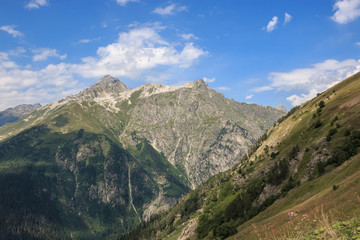 Naklejka premium Closeup view mountains scenes in national park Dombai, Caucasus, Russia, Europe