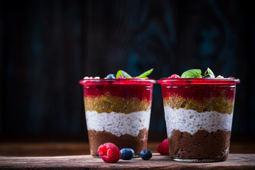 Homemade layered dessert with fresh fruits and chia seeds