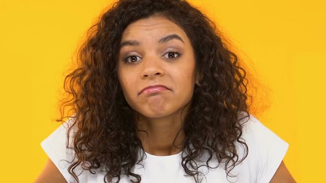 Cheerful girl loudly calling for friend, searching for missing, announcement