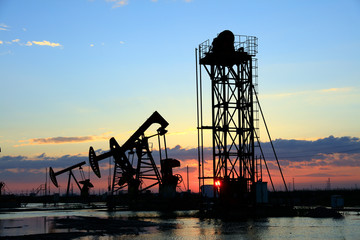 oilfield derrick in the evening