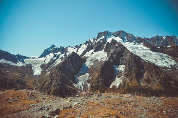 Fototapeta premium Closeup mountains scenes in national park Dombai, Caucasus, Russia