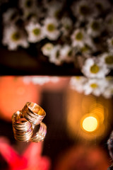 wedding rings and flowers