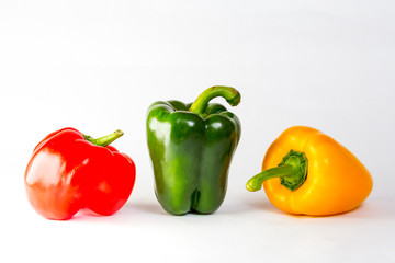 three peppers isolated on white background