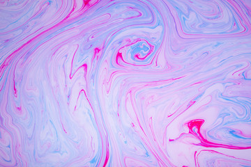 Abstract paint ink. Psychedelic background. Colorful spots on water surface.