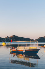 Fototapeta na wymiar Old excursion Boats in Ucagis, Mediterranean Sea. District of Kekova, province of Antalya, Turkey