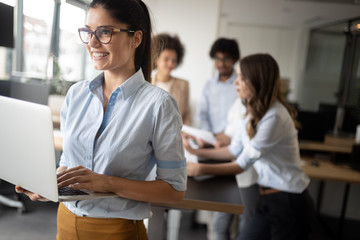 Business people working and brainstorming in office