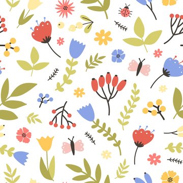 Spring seamless pattern with blooming plants on white background