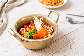 korean instant noodles in golden pot