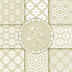 Compilation of floral patterns. White design with flowers on olive green background