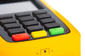 Yellow credit card reader terminal on isolated background. Easy payment method.