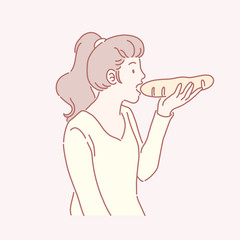Woman eating french bread