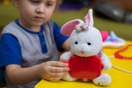 Little Boy Plays Doctor, Treats A Teddy Bunny