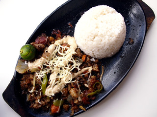 Freshly cooked Sisig on a hot plate