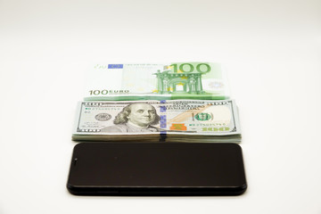 wallet with money and phone isolated on white background