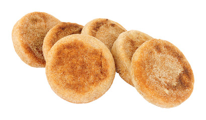 Group of wholemeal English muffins isolated on a white background