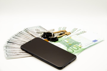 wallet with money and key isolated on white