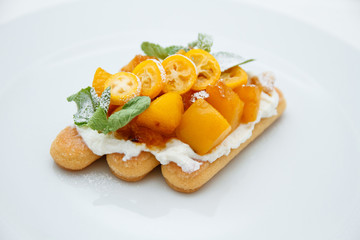Apricot tart cake with confiture and mint