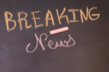 Fototapeta premium handwriting Breaking News Concept on Chalkboard with colorful chalk