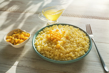 Sunny cornmeal porridge. Healthy breakfast.