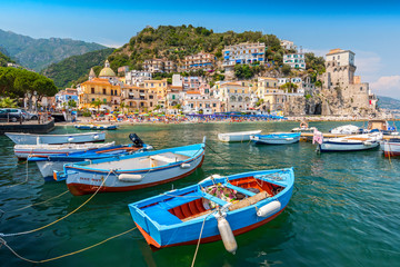 Leisure boats and traditional buildings in Cetara harbor, Amalfi coast, Italy. - obrazy, fototapety, plakaty
