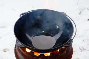 hot oil in a cauldron