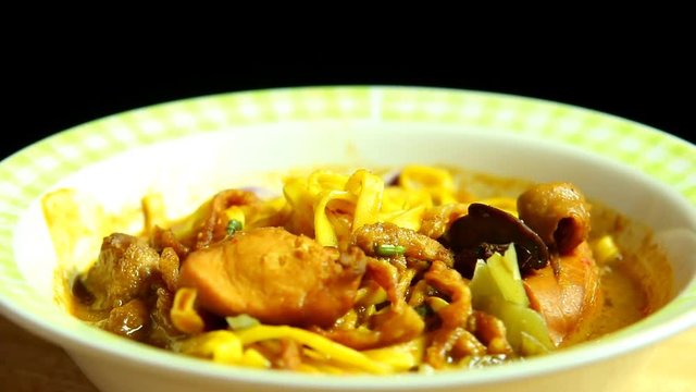 Curried noodle soup with chicken or Khao Soi, Thai northern food