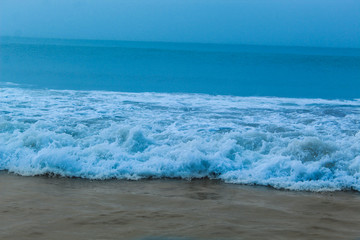 Fototapeta na wymiar blue sea beach water flowing