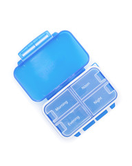 Blue plastic pill organizer Isolated on white background.