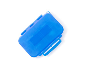 Blue plastic pill organizer Isolated on white background.