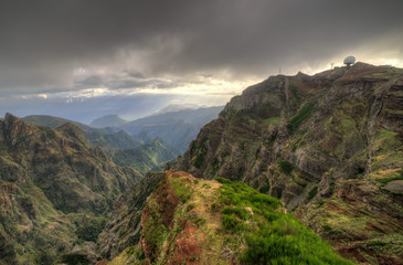 Beautiful panorama view of the landscape in the mountains of Madeira at Pico do Areeiro (Arieiro) while hiking to Pico Ruivo on a cloudy summer day