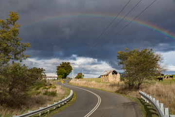 Rainbow over the road to Tunnack, Tasmania