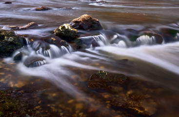 Nice cascade of mountain waterfall