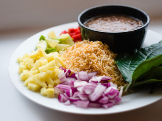 Close up, Close-up Thai-Style Savory Leaf Wraps (Miang Kham) a traditional snack from Thailand and Laos, introduced to Siamese court, Name Miang Kham