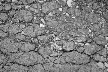 Cracked concrete texture closeup background
