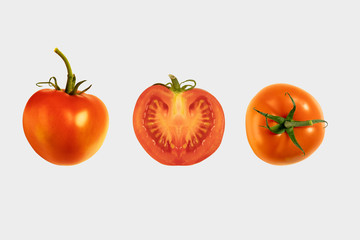 Red ripe tomatoes whole and cut on white background with clipping mask - image