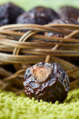 Obraz premium Soap nuts (soapberries). Chemical and toxin free laundry, organic detergent