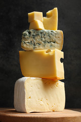 Cheese platter on wooden cutting board