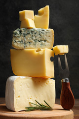 Cheese platter with rosemary and fork