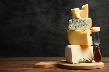Cheese platter with rosemary and fork - obrazy, fototapety, plakaty