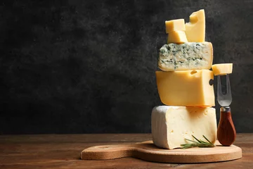 Foto op Plexiglas Cheese platter with rosemary and fork © Studio KIVI