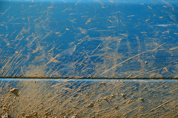 splash of mud on blue car texture