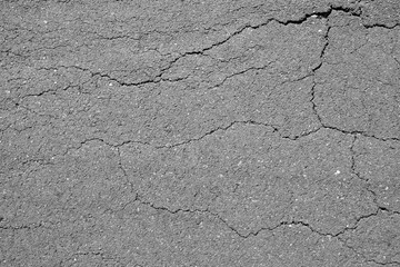 crack on asphalt road texture
