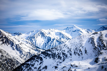 Fototapeta na wymiar Sunrise in high mountain snowy landscape