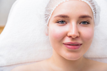 Woman waiting for procedure in beauty salon