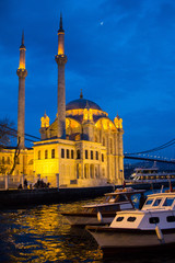 Naklejka premium Exterior view of Ortakoy Mosque near the Bosphorus Bridge in Istanbul