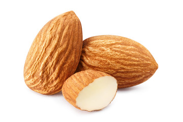 Close-up of almonds with leaves, isolated on white background